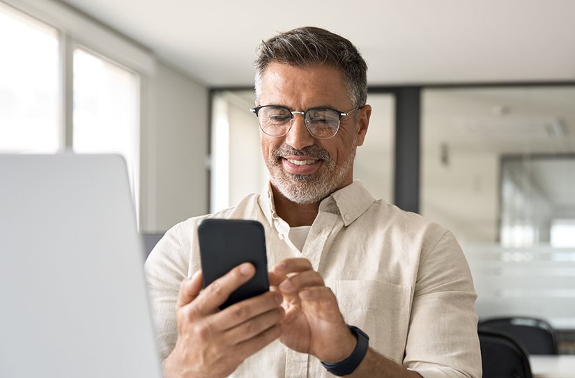 Adult male using a smart phone